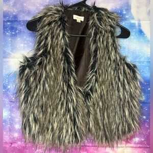 Maurice’s furry vest 🛍